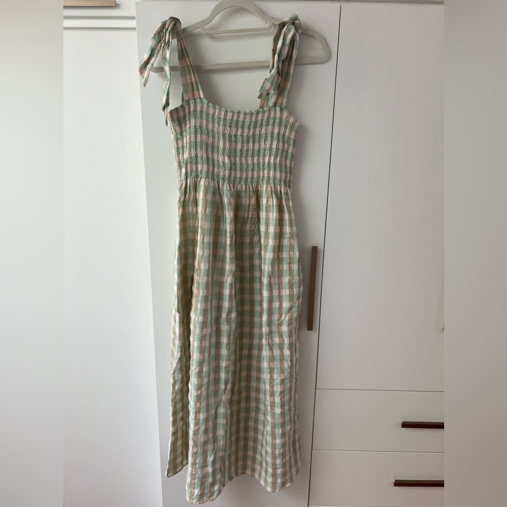 Smocked gingham dress with adjustable tie straps